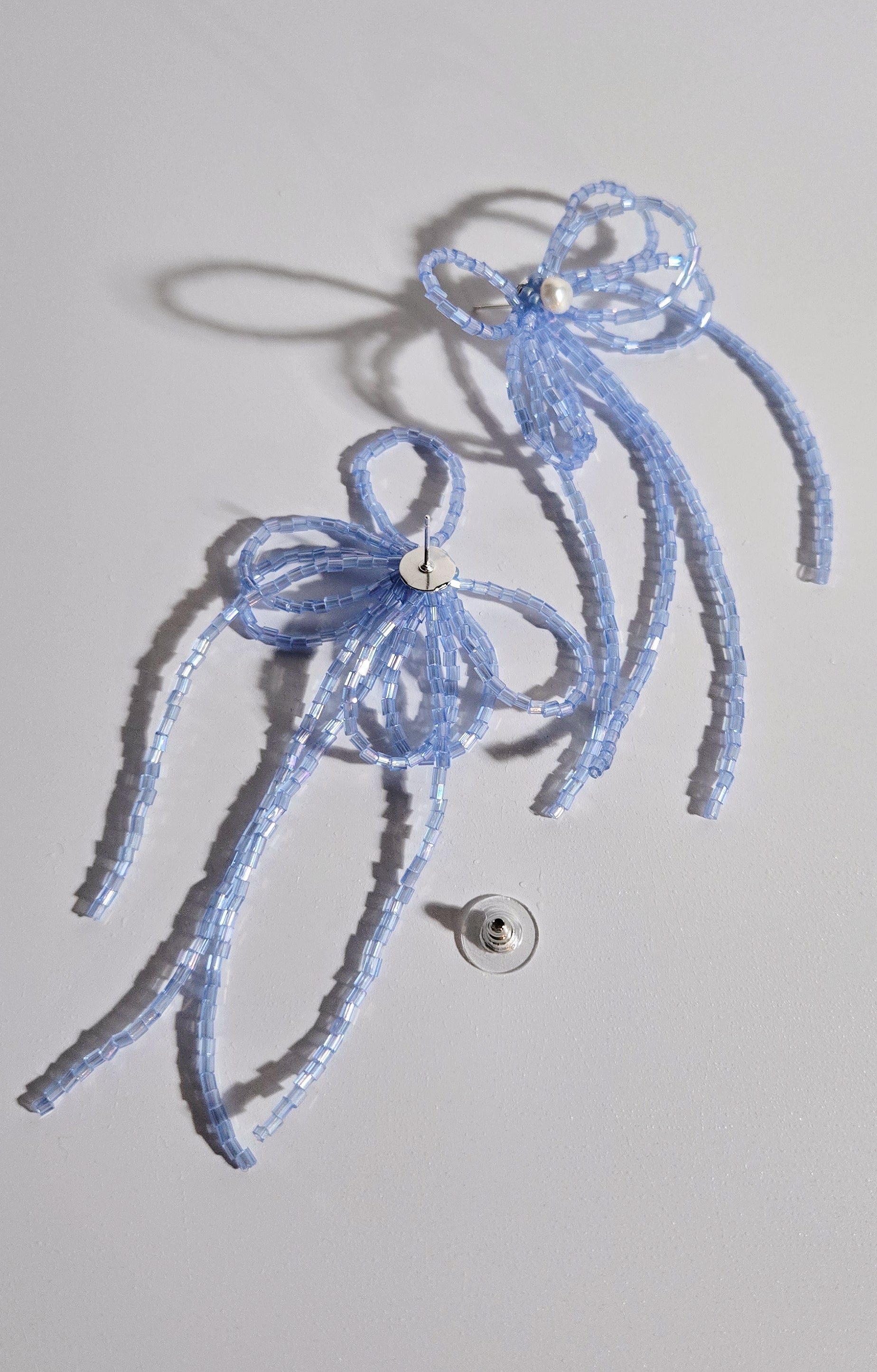 Boucles nœud avec perle