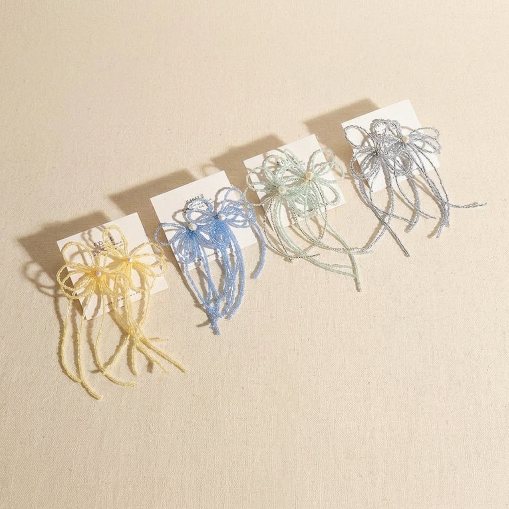 Boucles nœud avec perle